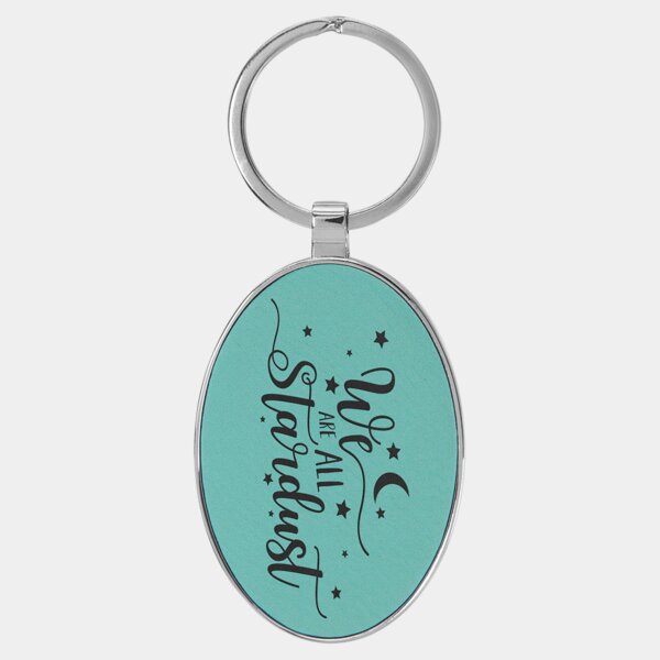 Personalized 3" x 1 3/4" Laserable Leatherette/Metal Teal Oval Keychain Thumbnail
