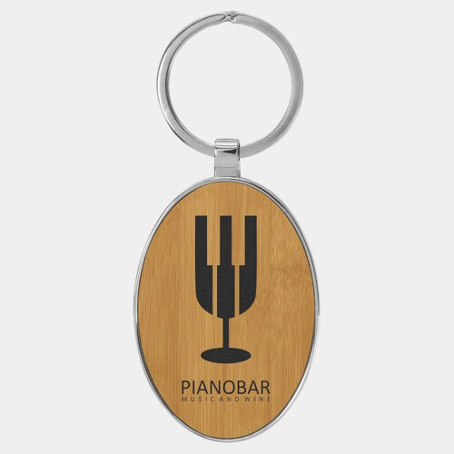 Personalized 3" x 1 3/4" Laserable Leatherette/Metal Bamboo Oval Keychain Thumbnail