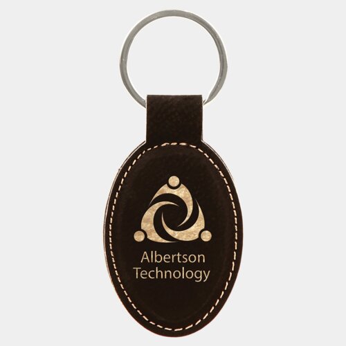 Personalized 3" x 1 3/4" Black/Gold Laserable Leatherette Oval Keychain Thumbnail